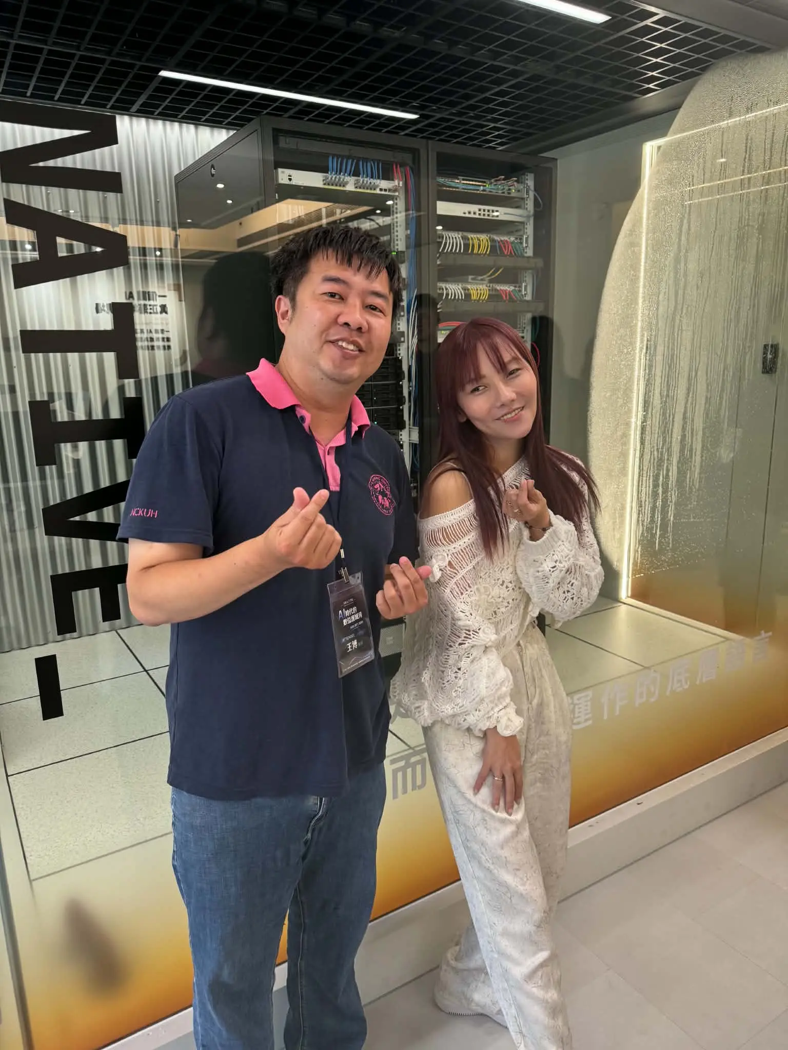 Bow Wang visiting the AI data center with Lulu, owner of the host company